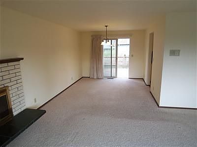 Lots natural light and territorial views from this living room. Snuggle up to 