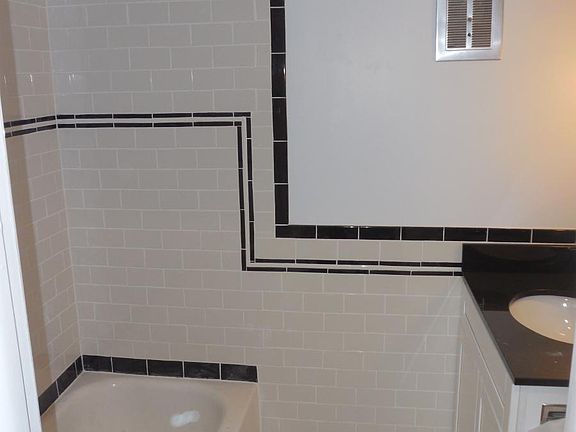 New full tile bath with all new ceramic tie walls and floor