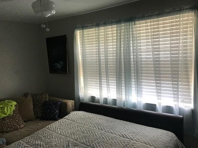 Close Your New Blinds for a Softer Effect. Bedroom.