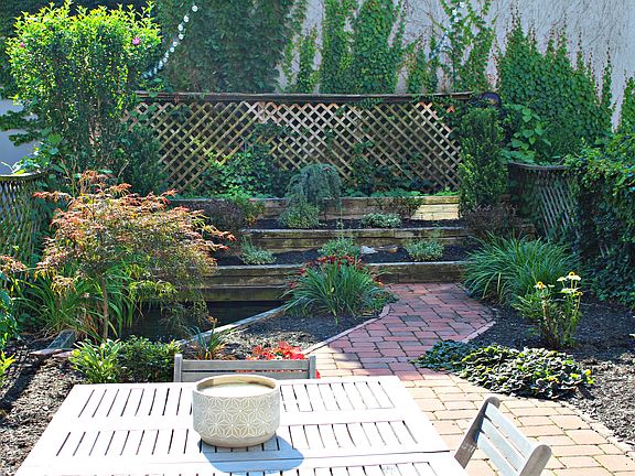 gas grill and pond feature