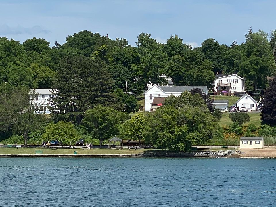 View of house from the water. House to the left of the picture. Cayuga beach area just across the street from the house.