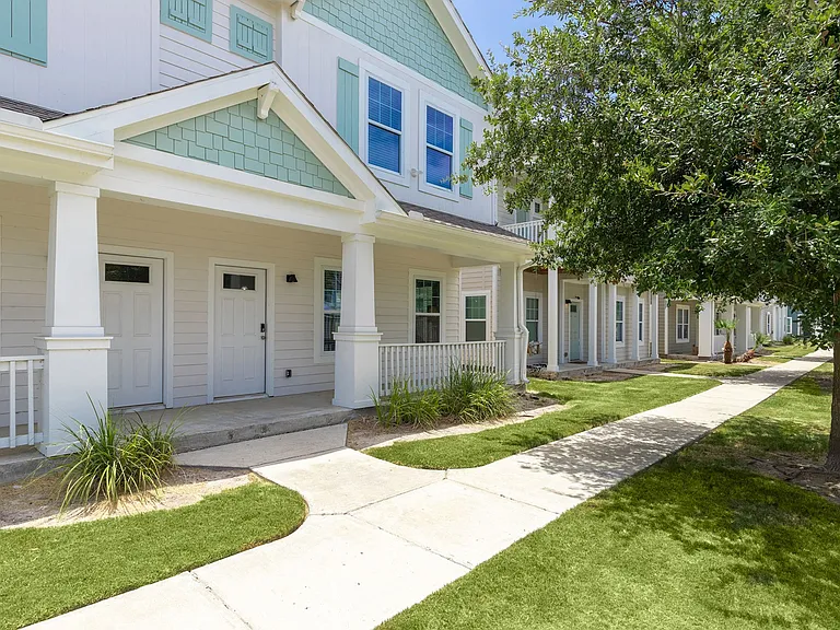 Enjoy Coastal Living in Beautiful Townhomes with Spacious Porches at Seaglass Apartments - Your Corpus Christi Home Awaits