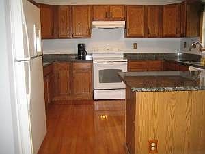 gleaming wood floors in kitchen