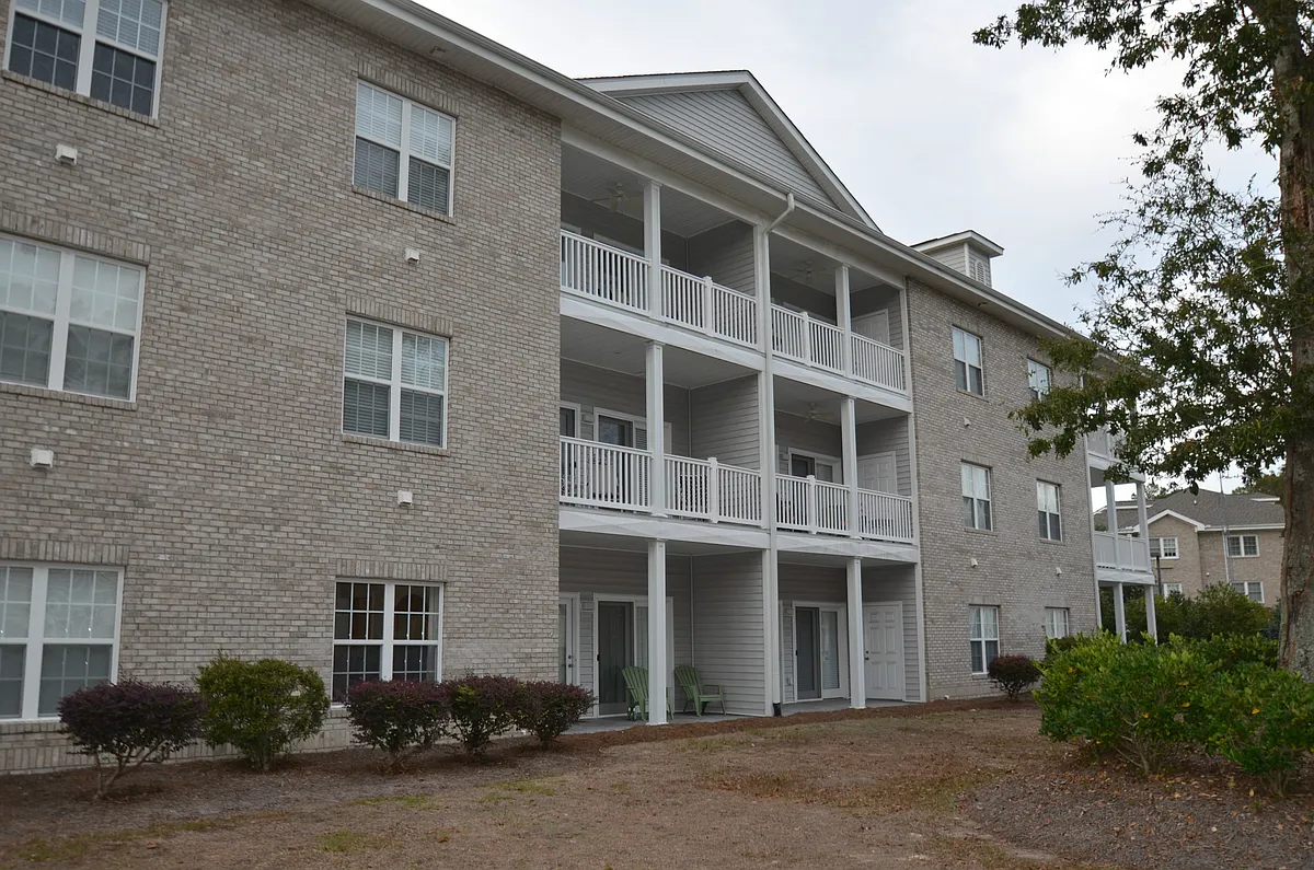 Photo 2 of 14 - 908 Resort Cir #703 - Sunset Beach, NC Building Photo - 908 Resort Cir #703