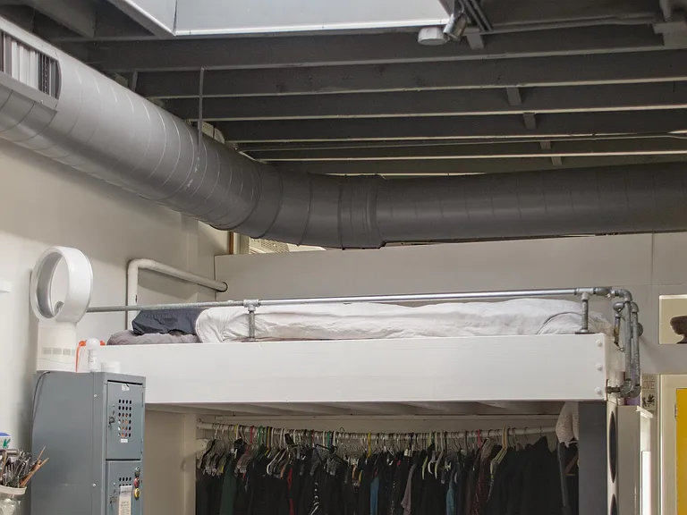 Extra guest bed, lofted above