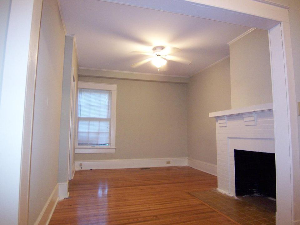 Living room w/ fireplace mantel