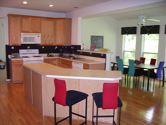 Gourmet Kitchen with Light Filled Sunroom