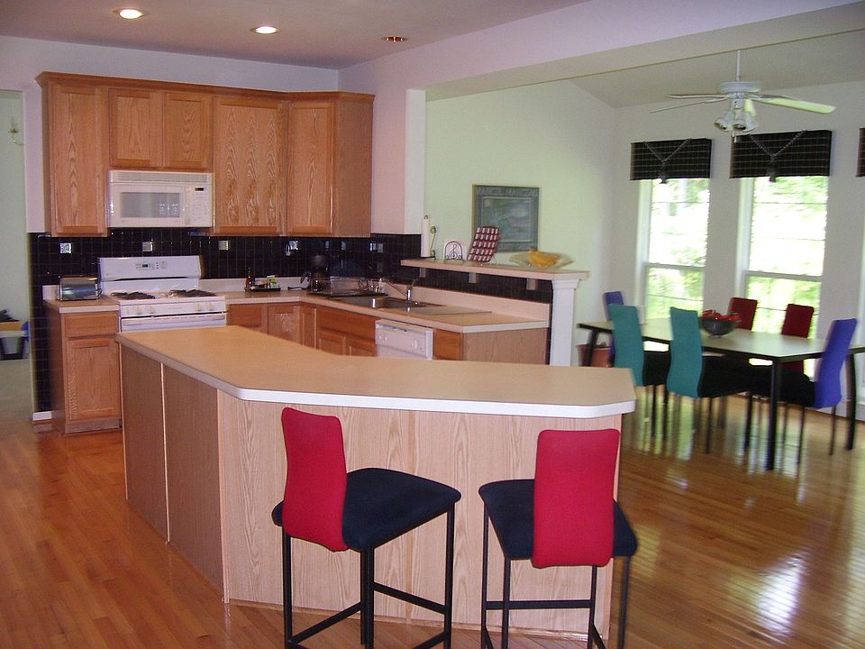 Gourmet Kitchen with Light Filled Sunroom