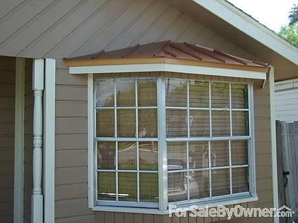 Main Home
						:
						Bay Window with Copper Metal Trim Roof