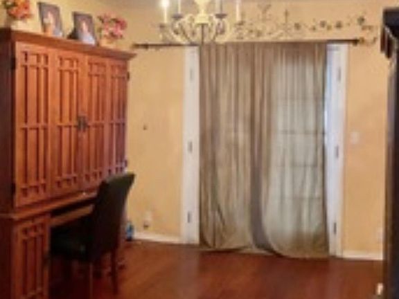 Dining Room being used for Office! These are not Laminate but Hardwood Brazilian Cherry!