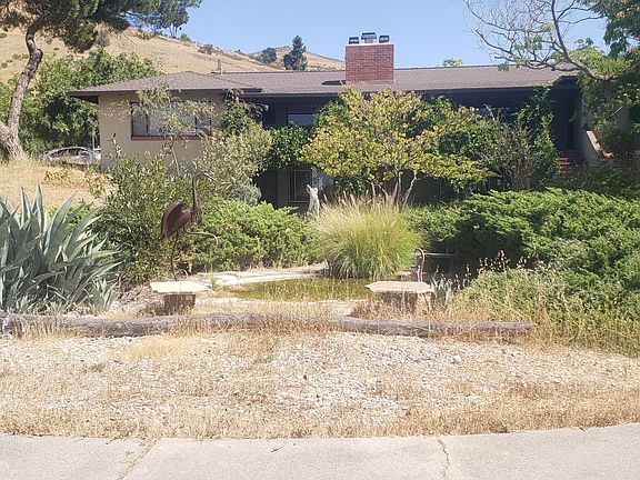 Front Drive Circle with Fish Pond
