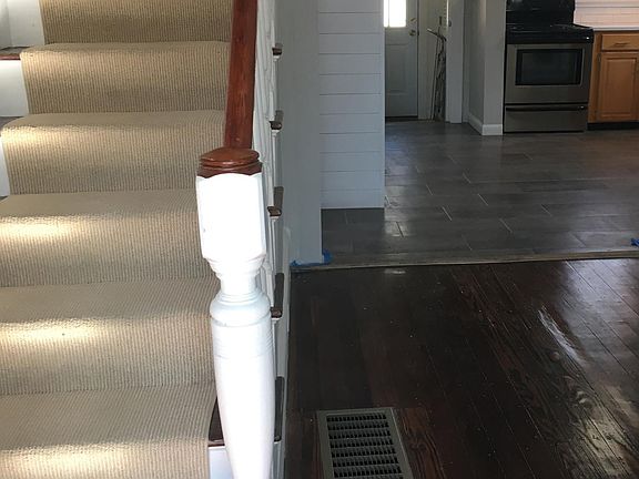 Living / stairs up to bedrooms / bath