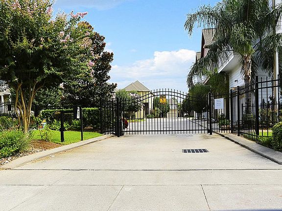 Beautifully landscaped private gated community.