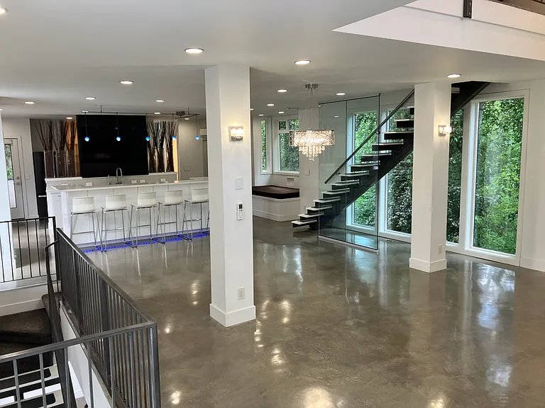 Main Floor looking NE: floor to ceiling views of the forest!