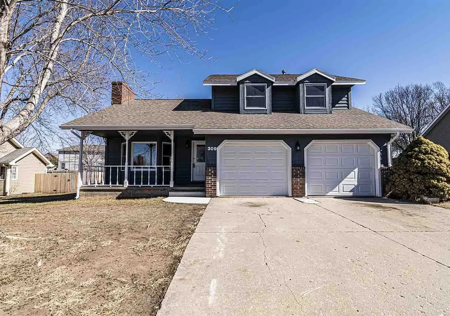 Spacious Home with Finished Basement & Fenced Backyard — Photo 1