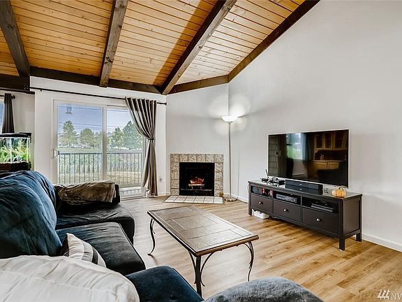 Real wood Fireplace and Lots of light from scenic balcony 