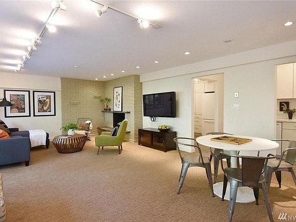 Living room with wood-burning fireplace