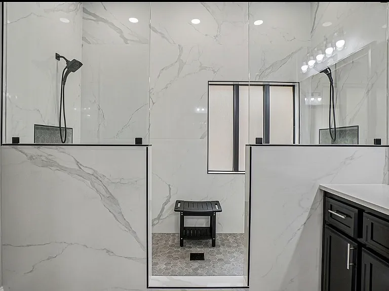 Primary shower. Has 2 shower heads for a fully dual shower concept!