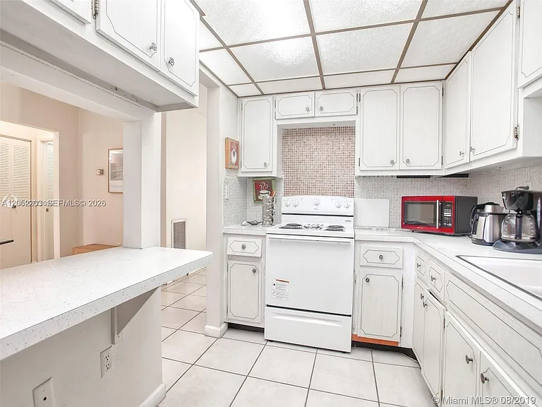 1475 NE 125th Ter #112A — Photo 11