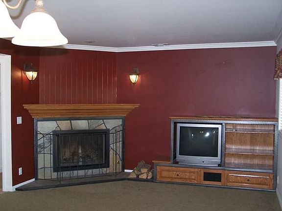 Gorgeous rod iron-fp, Idaho quartz, custom made mantel w/entertainment center