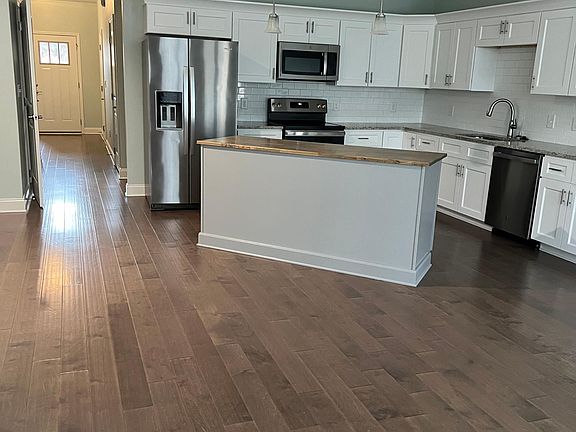 Kitchen area with appliances included