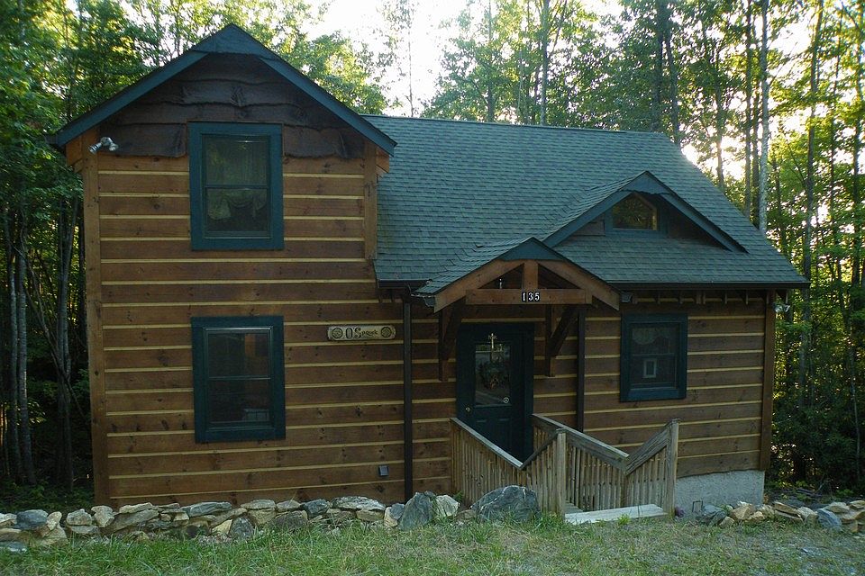 Stick built log cabin