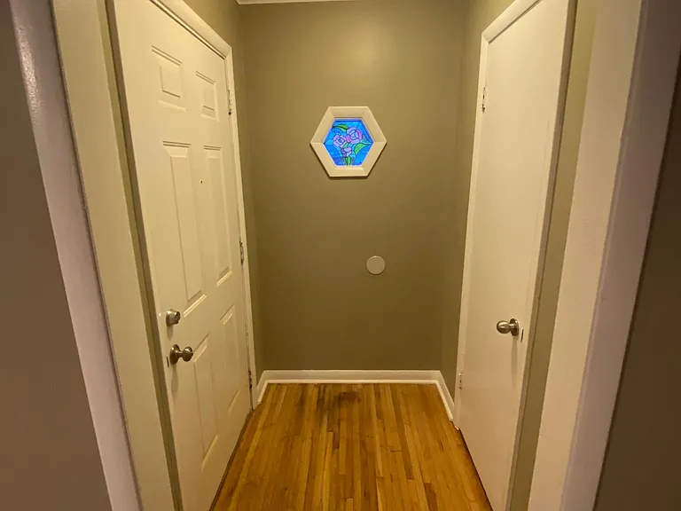 Entry with original stain glass window