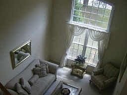 Two Story Living Room and Foyer