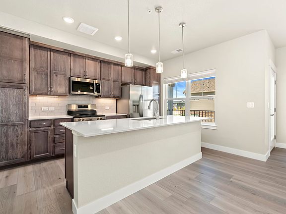 Photos are of our previous Columbia floor plan finishes and exact dimensions will vary