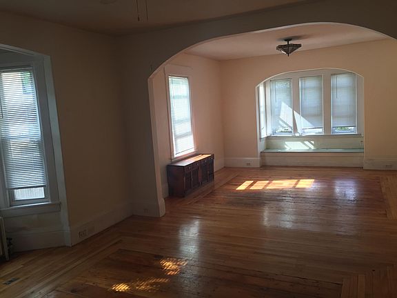 large living room/family room, possible 3rd bedroom if divided.