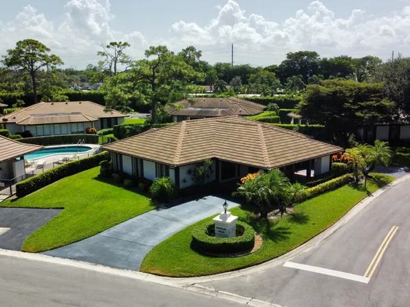 550 Woodland Circle, Atlantis, FL 33462