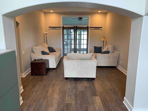 Front sitting room which leads into flex room.