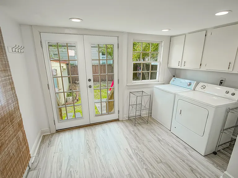 Laundry room and backdoor exit to back yard and garage.