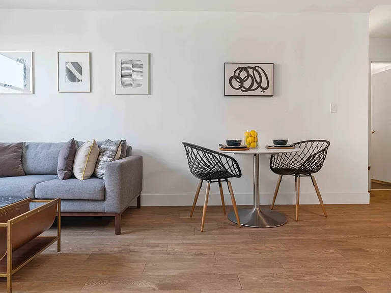 Large living room with space for a dining table or workspace