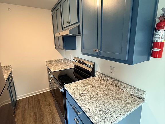 New appliances, cabinets, and granite countertops