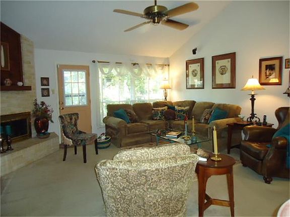 Another view of living area with great views to your private backyard.