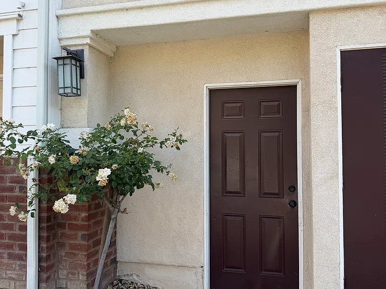 Entryway to private detached two-car garage.