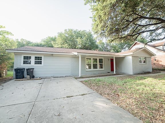 Front of the house + driveway.
