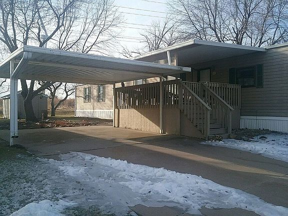 Great covered deck & carport