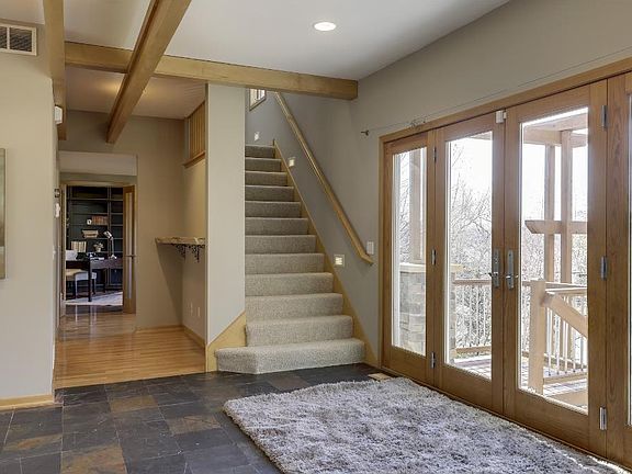 Spacious foyer opens up to the main floor great room with tons of light and high ceilings.