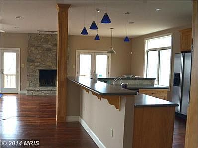 Open Great Room with Stone Fireplace