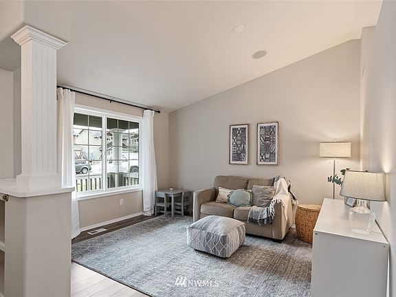 Front living room offers great light and is wildly versatile.