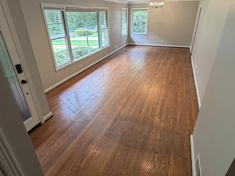 View from Bedroom 2's door, looking into the dining room & living room area