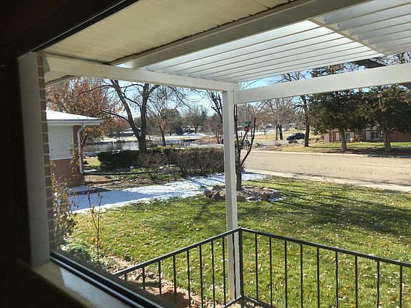 View out the front window towards the pond and park.