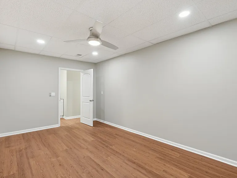 Lower Level - Large Bedroom (or Entertainment Room / Office Room / Gym etc) with Ceiling Fan, LED Lighting