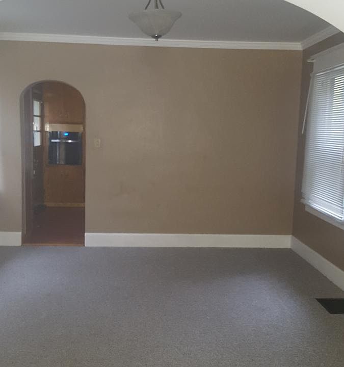 Dining room leading into kitchen