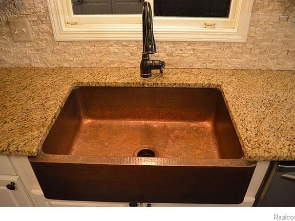 Elegant copper apron sink