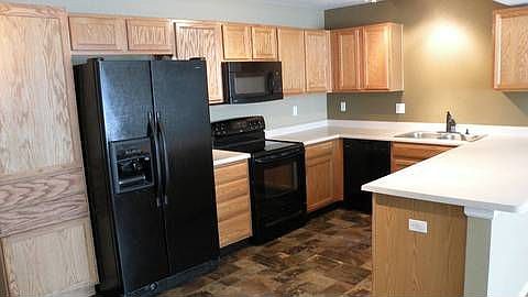 MAPLE CABINETS AND NEWER FLOORING