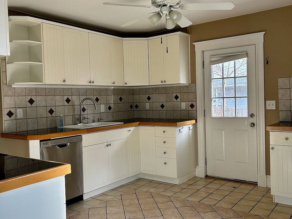 Updated, efficient kitchen with ample cabinet space and excellent natural light.