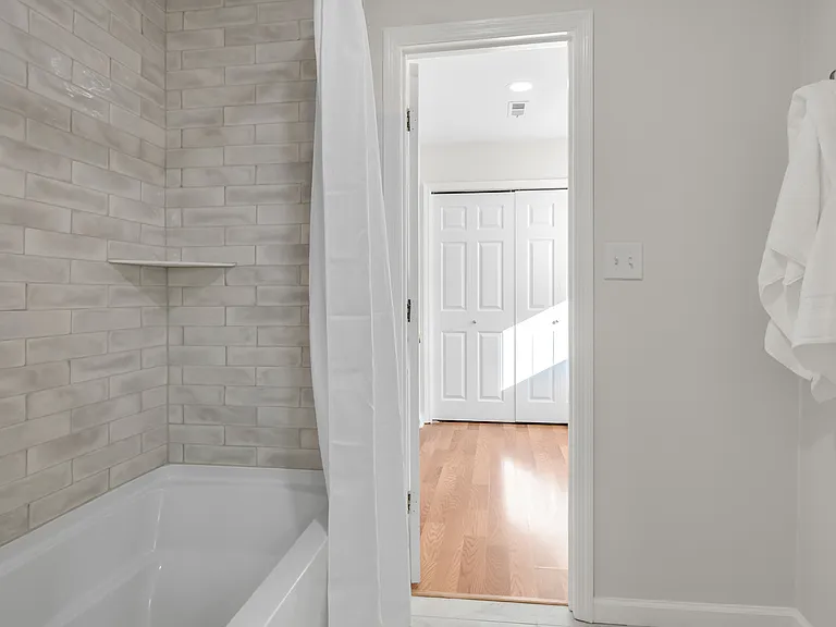 Shower/tub and toilet room in upstairs bathroom